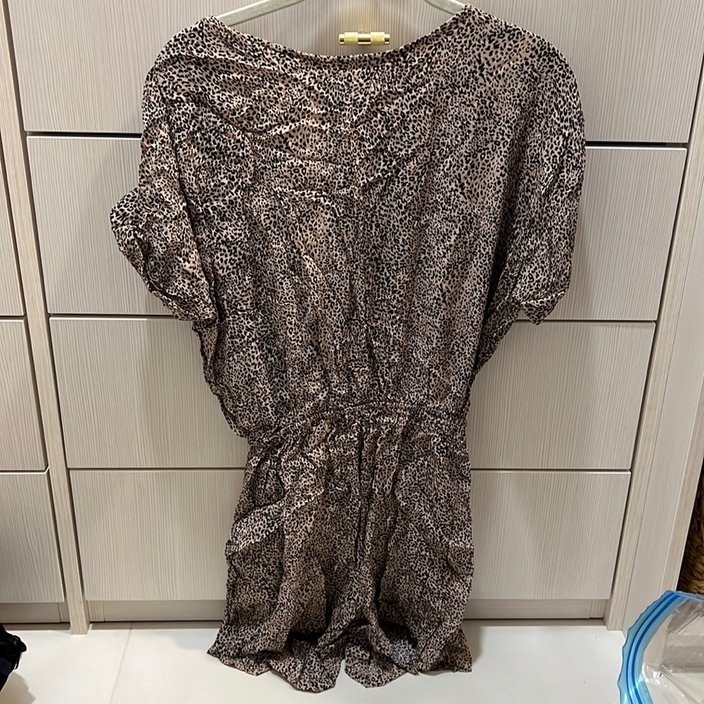 Cheetah jumper with back out